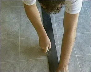 Taking measurements before vinyl flooring installation