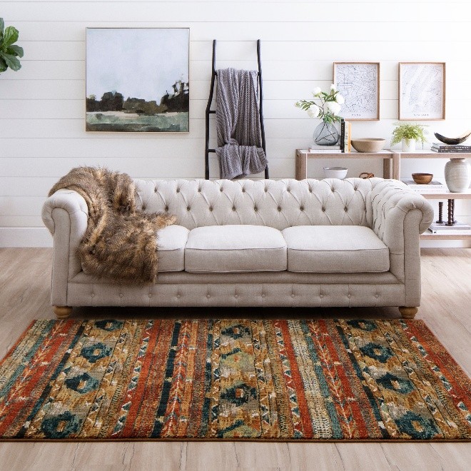 Designer carpet in the entrance of a living room | DeGraaf Interiors
